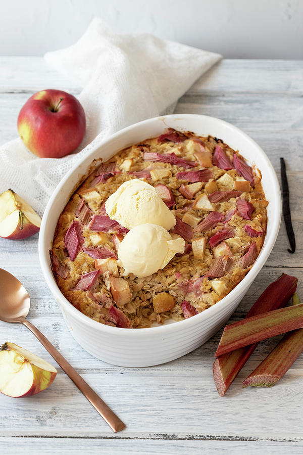 Baked Oatmeal With Apples And Rhubarb, Served With Vanila Ice Cream Photograph by Zuzanna Ploch