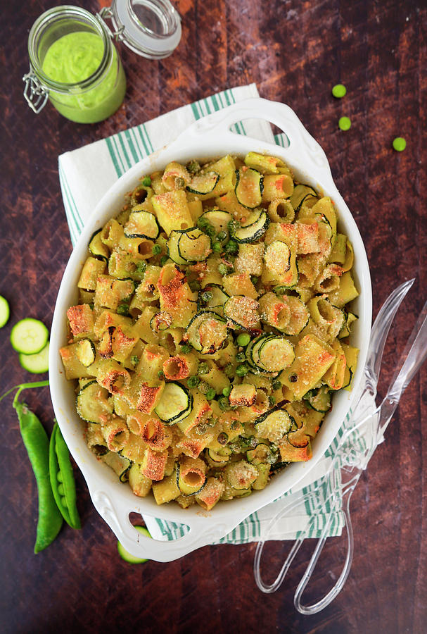 Baked Pasta Au Gratin With Zucchini, Fresh Peas And Robiola Cheese Photograph by Claudia Gargioni