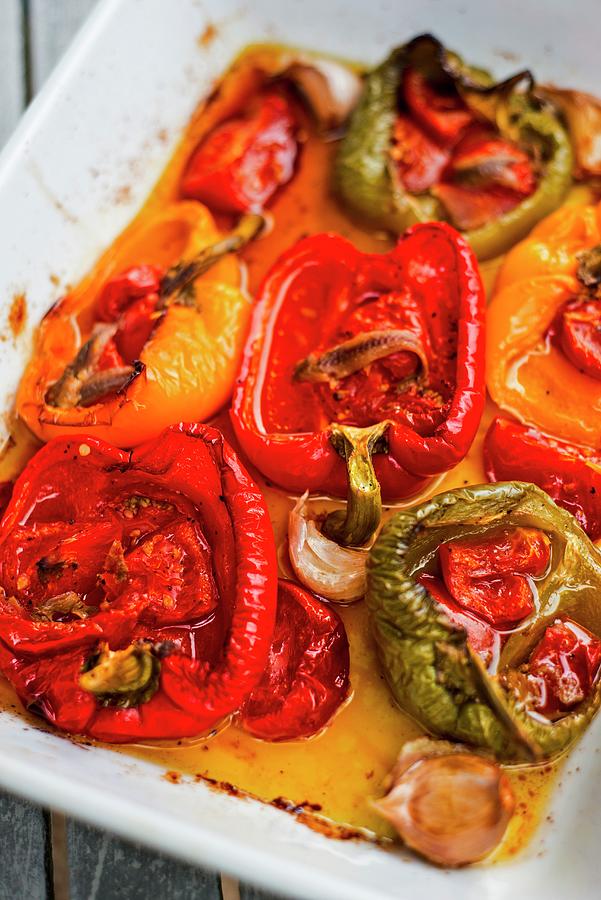 Baked Peppers With Garlic Photograph by Roger Stowell
