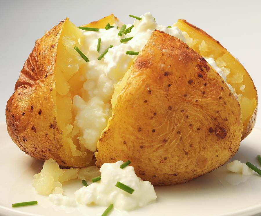 Baked Potato With Cottage Cheese And Chives Photograph by Hugh Johnson ...