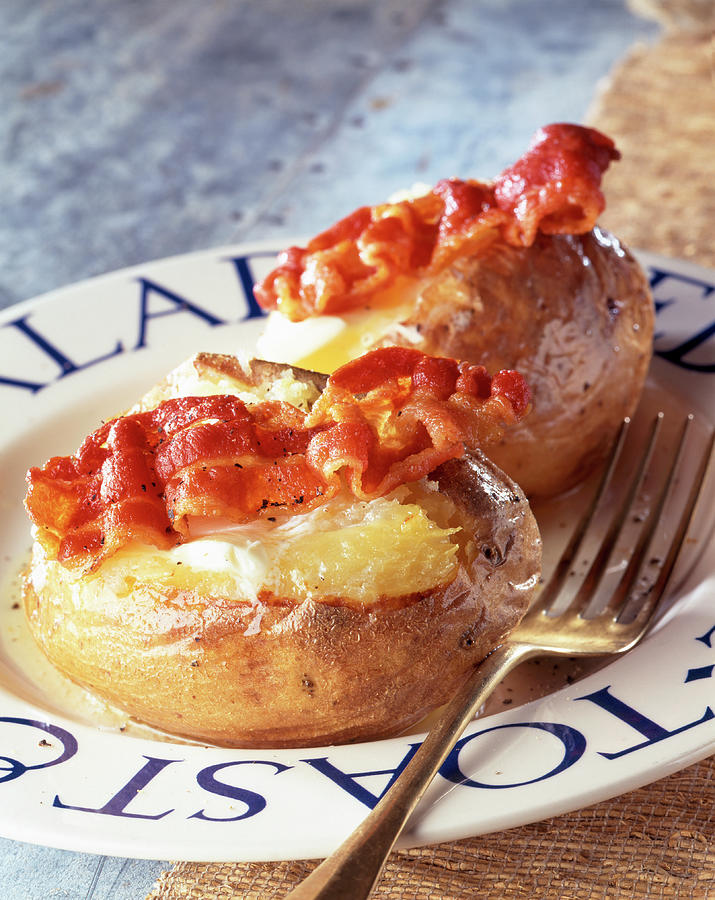 Baked Potatoes With Bacon Photograph by Franco Pizzochero