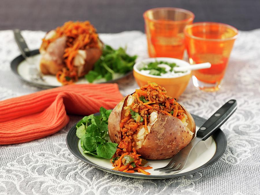 Baked Potatoes With Chilli Con Carne, Cheese And Sour Cream Photograph by Frank Adam