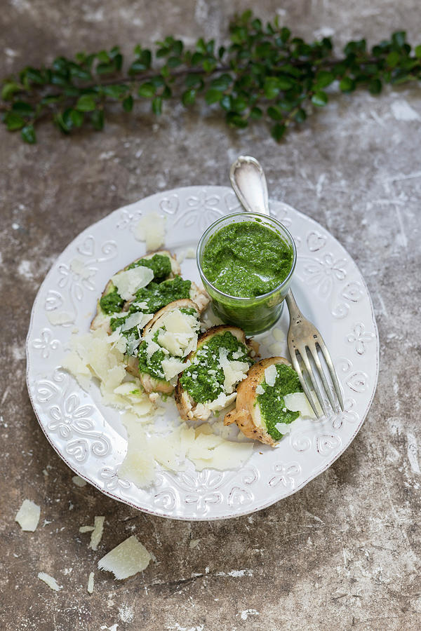Baked Potatoes With Pesto And Parmesan Cheese Photograph by Adel Bekefi
