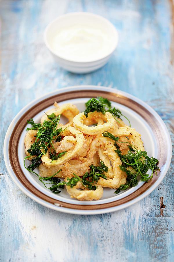 Baked Squid Rings With Fried Parsley Photograph by Boguslaw Bialy