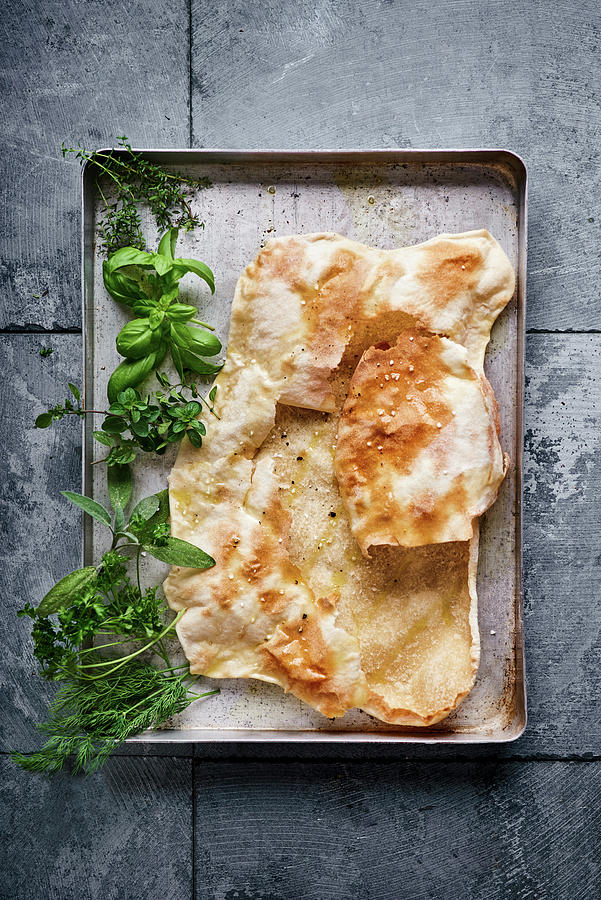 Baked Tarte Flambe Dough With Fresh Herbs On A Baking Tray Photograph by Angelika Grossmann