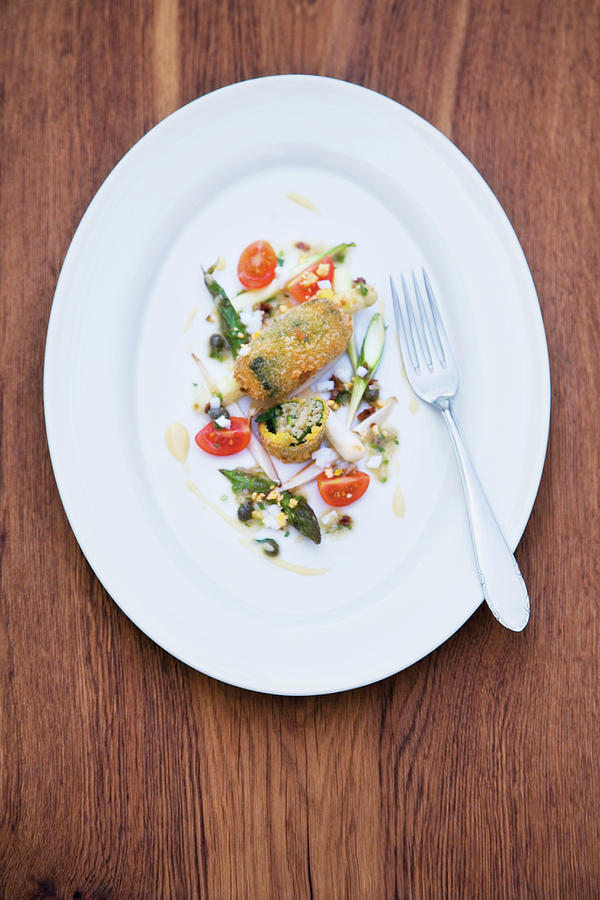 Baked Zander Croquettes With Asparagus Photograph by Michael Wissing