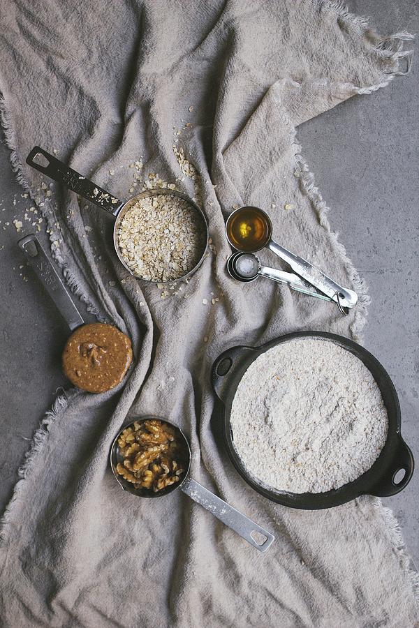Baking Ingredients With Nuts And Flour Photograph by Tanya Balianytsia