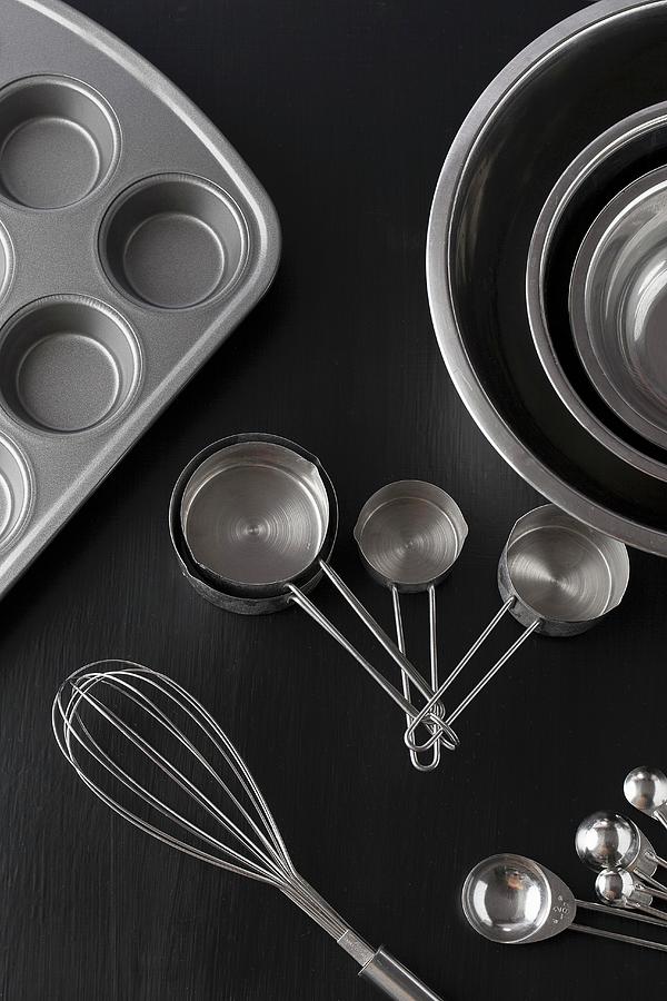 Baking Utensils In Glass Mixing Bowl Photograph by Vfoodphotography