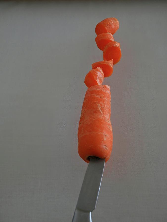 Balanced carrot Photograph by Martin Smith