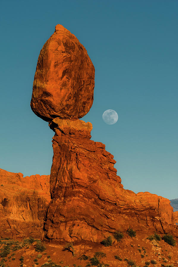Balanced Rock And Full Moon In Arches Photograph by Jeff Foott