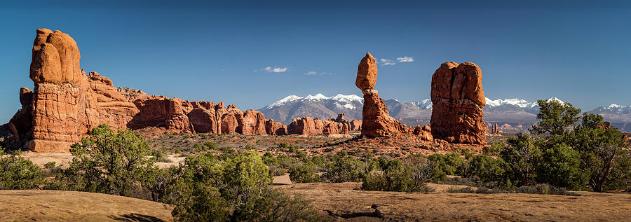 Balanced Rock and the La Sal Mountain Range Photograph by David Morefield