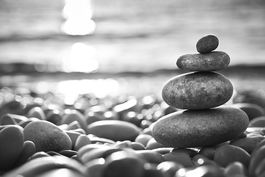 Balanced Stones On A Beach - Black And Photograph by Spooh
