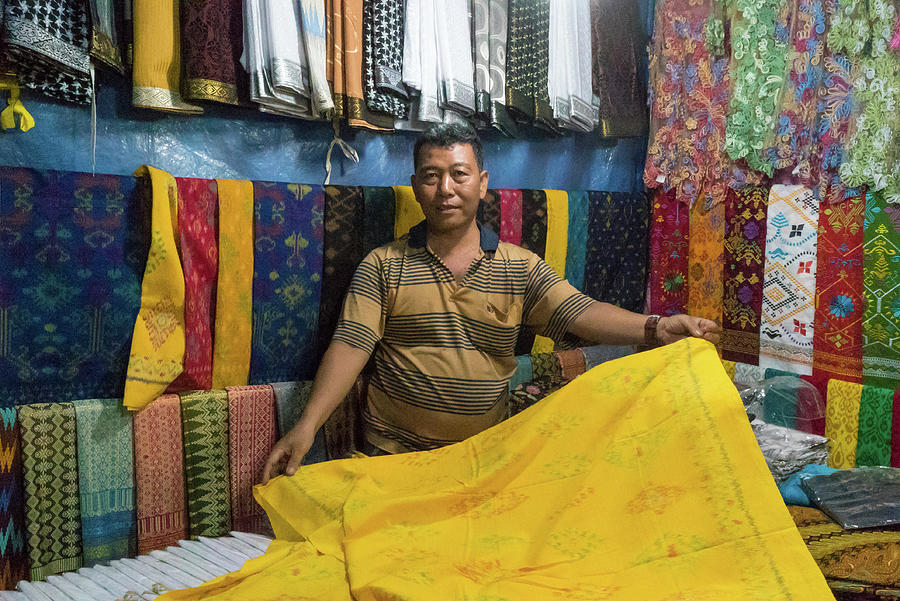 Bali Fabric Vendor at Night by Harry Donenfeld Bali Fabric Vendor at Night by Harry Donenfeld