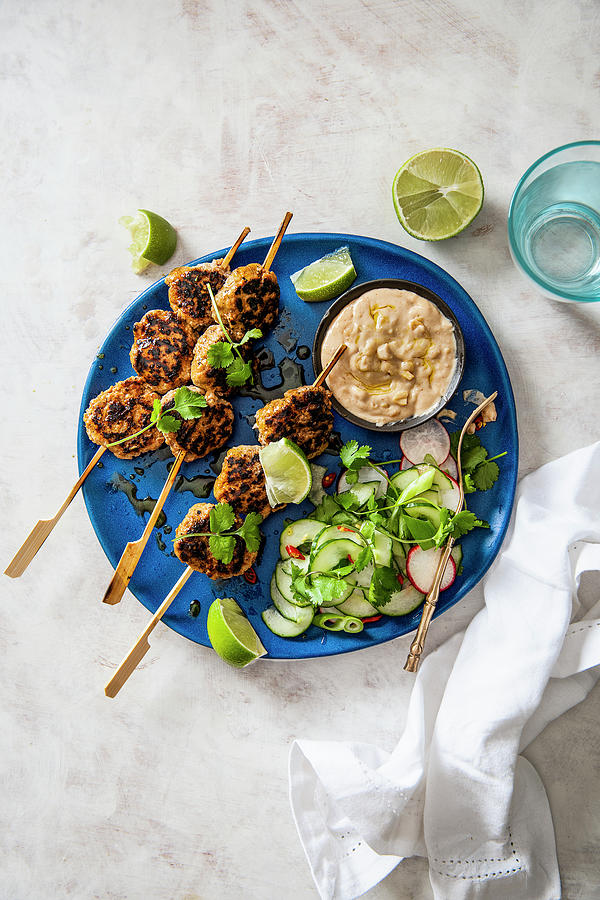 Balinese Minced Pork Satay With Quick Pickled Cucumber Salad And Satay Sauce Photograph by Magdalena Hendey