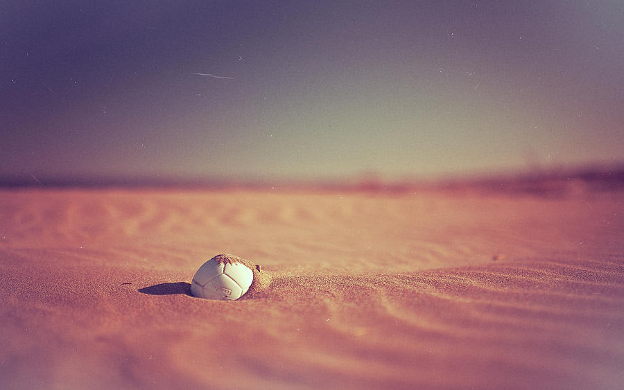 Ball At Beach Photograph by Alberto Cassani