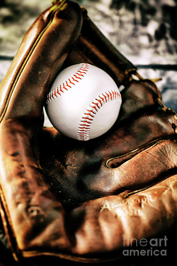 Ball in the Vintage Glove Photograph by John Rizzuto