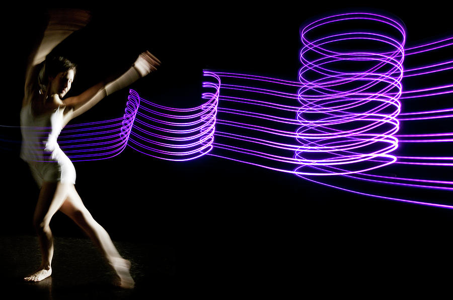 Ballerina Dances In Purple Graphic Photograph by John Rensten