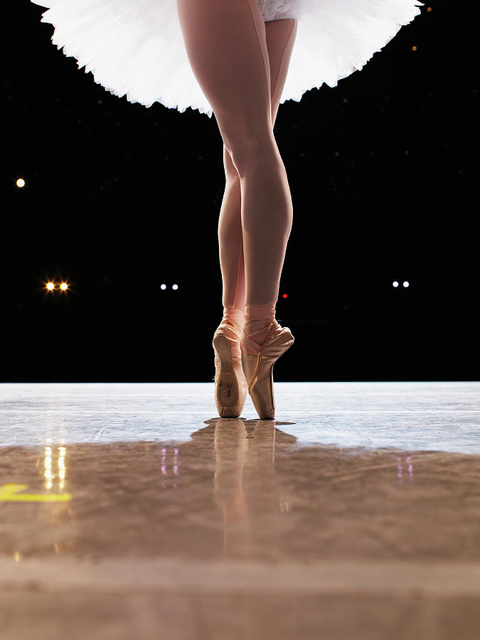 Ballet Dancer Photograph - Ballerina En Pointe On Stage, Low by Thomas Barwick