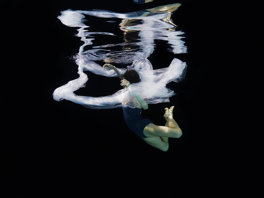 Ballerina Falling Through Fabric Photograph by Thomas Barwick