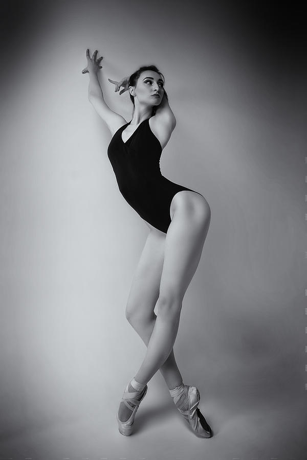 Energetic Photograph - Ballerina In A Bodysuit Improvises Classical And Modern Choreography In A Photo Studio by Alexandr