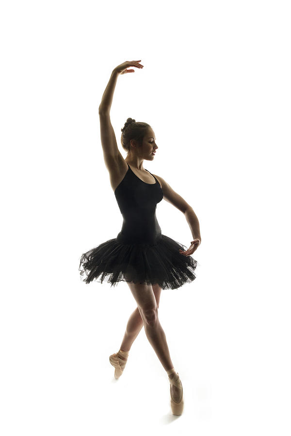 Ballerina In A Tutu Dancing En Pointe Photograph by Phil Payne Photography