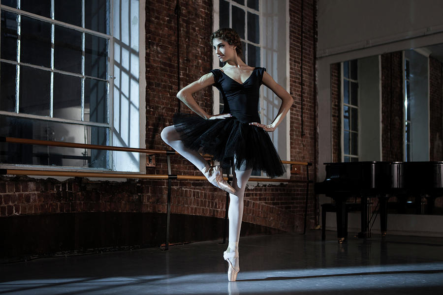Ballerina Performing Passe Devant In Photograph by Nisian Hughes
