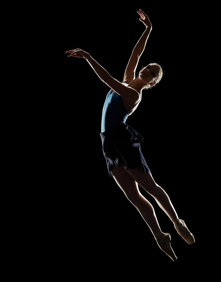 Ballet Dancer In Pas De Poisson Position Photograph by Lewis Mulatero