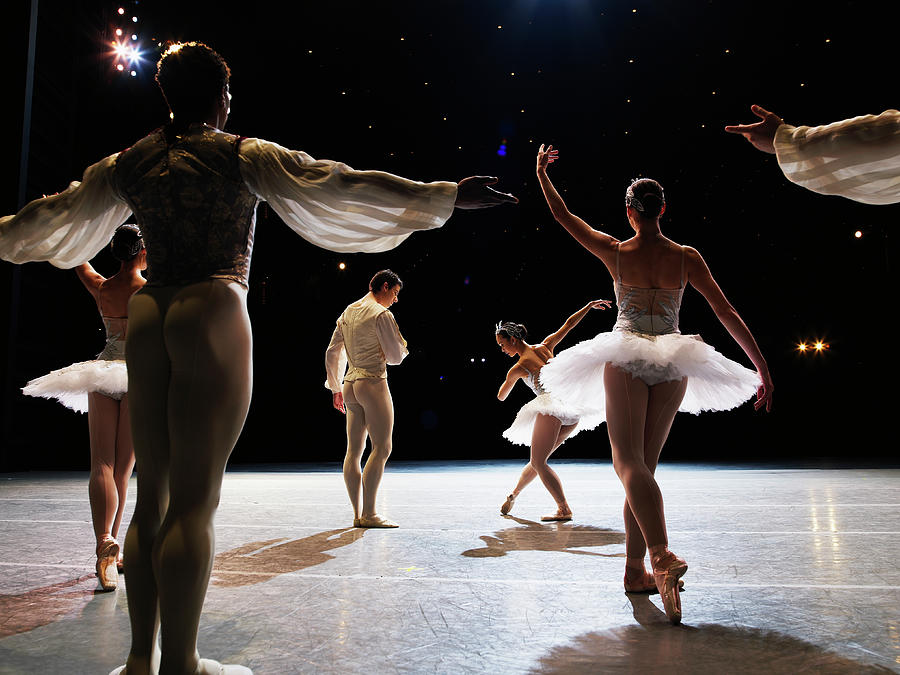 Ballet Dancers Bowing On Stage At End Photograph by Thomas Barwick