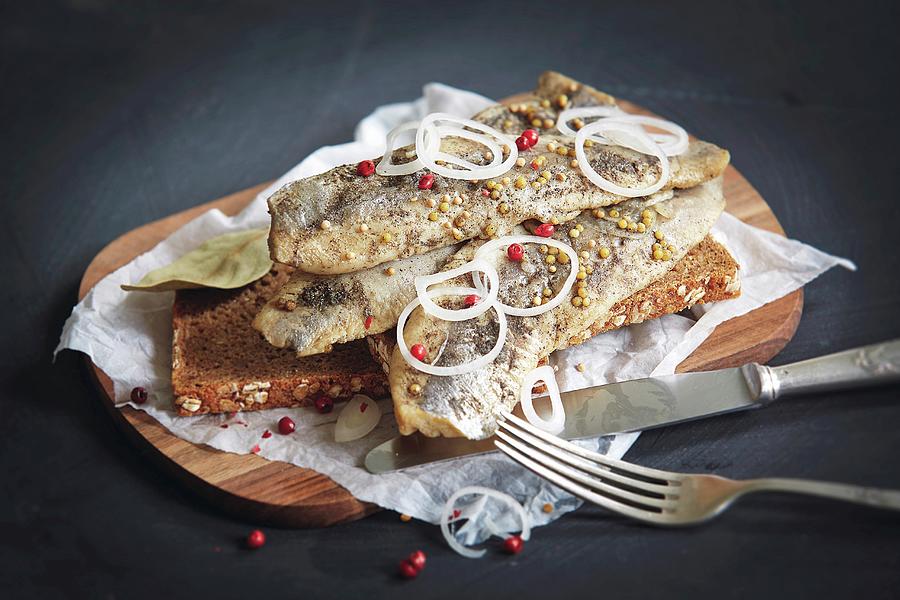 Baltic Herring With Pepper And Onion On Bread Photograph by Jalag / Michael Bernhardi