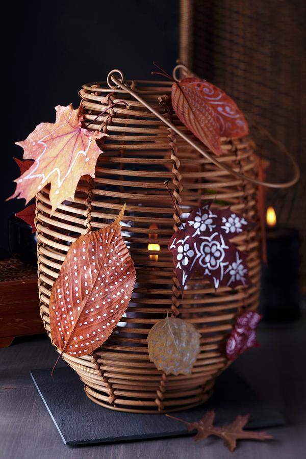 Bamboo Lantern Decorated With Painted Autumn Leaves Photograph by Franziska Taube