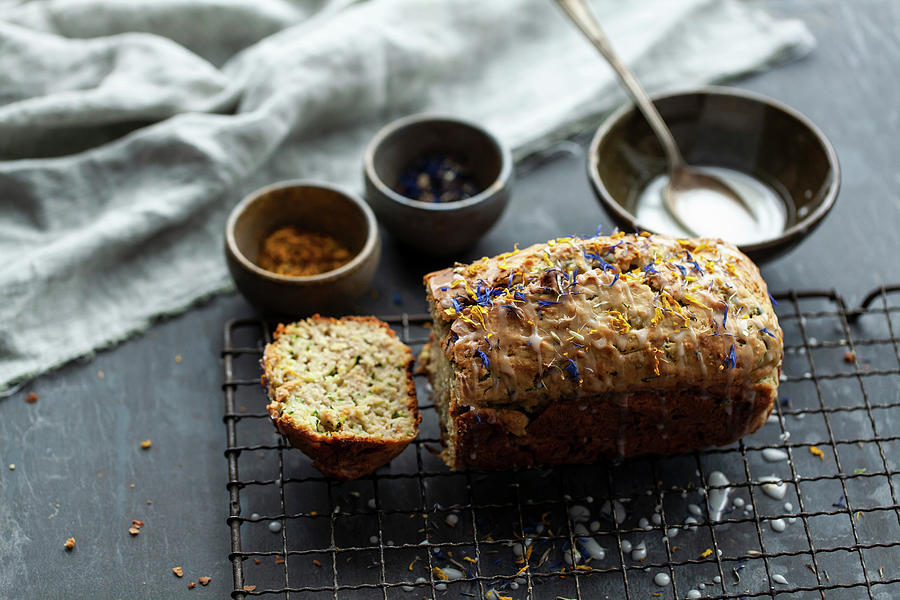 Banana And Courgette Bread With Edible Flowers Photograph by Lara Jane Thorpe