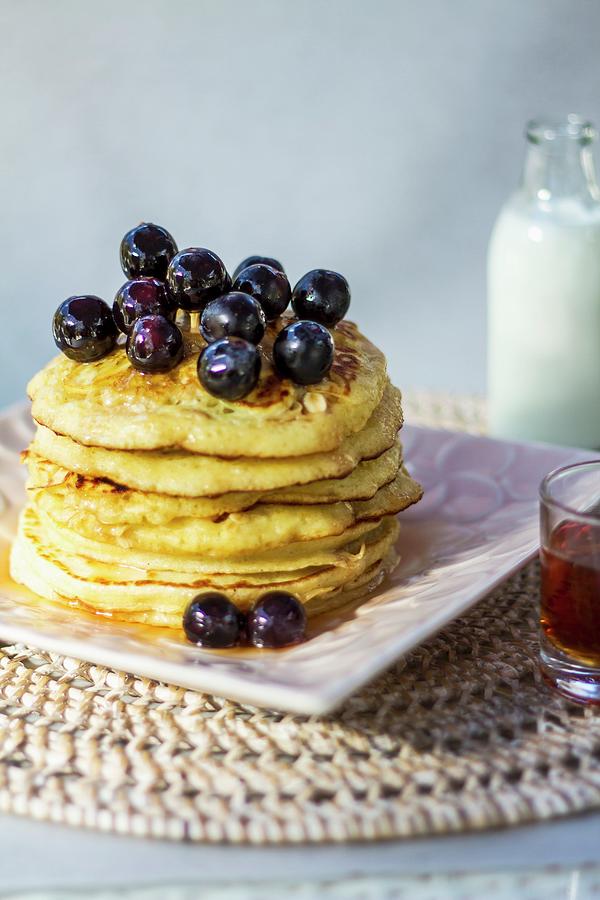 Banana And Linseed Pancakes With Blueberries And Agave Syrup Photograph by Elle Brooks
