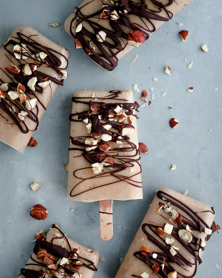 Banana And Peanut Butter Ice Cream Sticks With Chocolate And Chopped ...