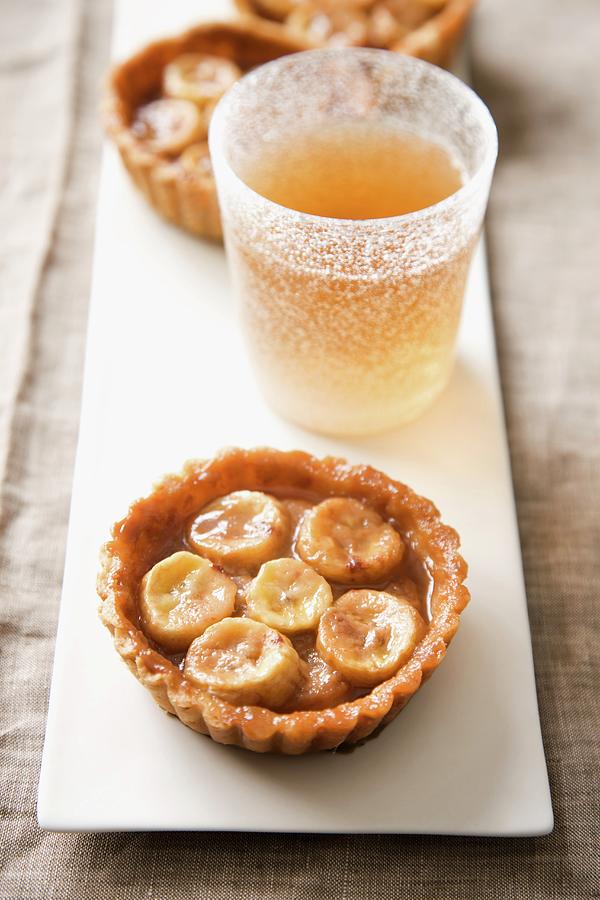 Banana And Toffee Tartlets Photograph by Lerner, Danny