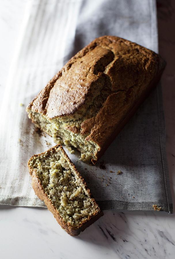Banana Bread, Cut In Half Photograph by Annie Kuster