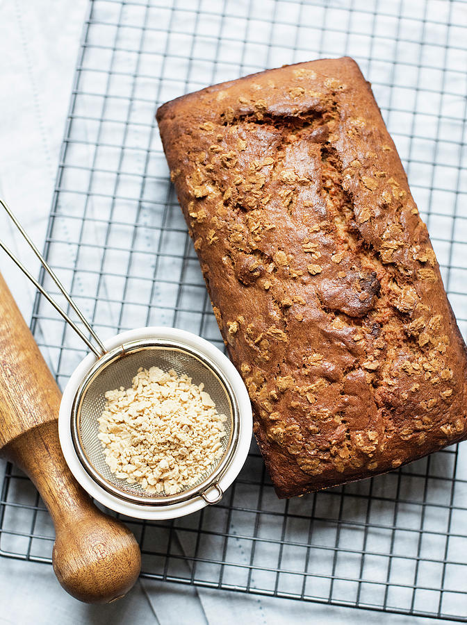 Banana Bread On Cooling Rack And Maple Flakes Digital Art by Magdalena ...