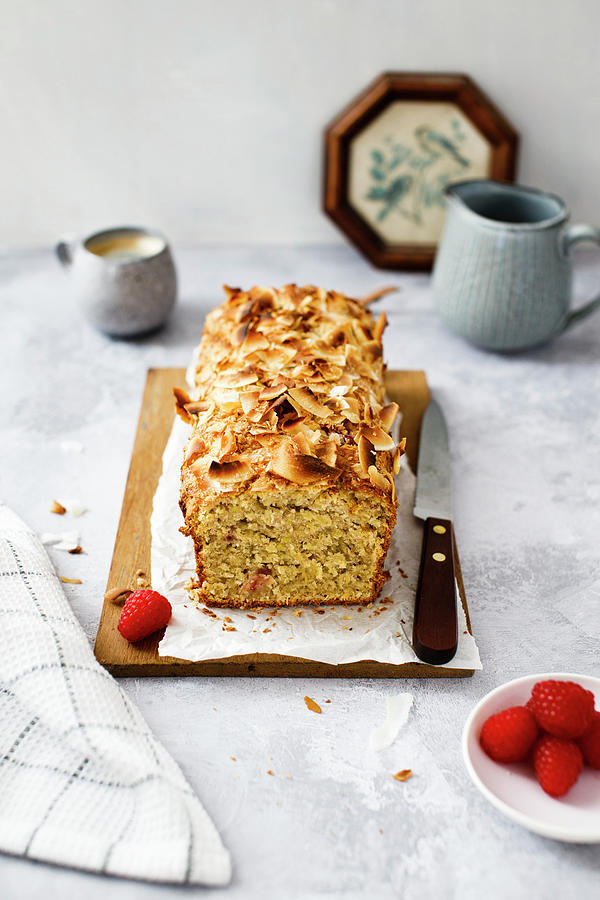 Banana Bread With Coconut And Raspberries Photograph by Annalena Bokmeier