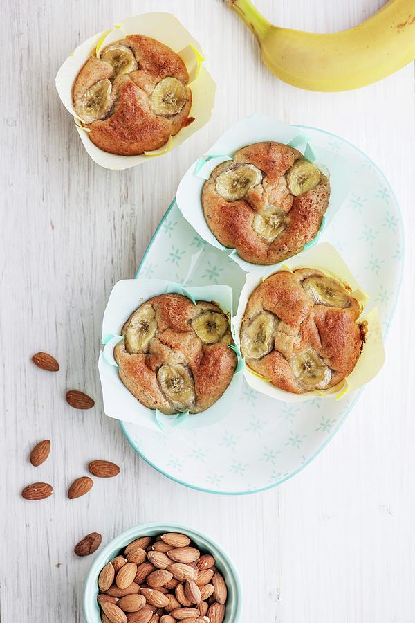 Banana Muffins With Toasted Almonds Photograph by Ina Peters
