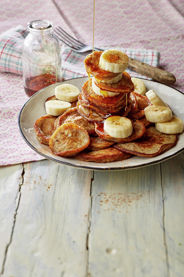 Banana Pancakes With Maple Syrup Photograph by Meike Bergmann