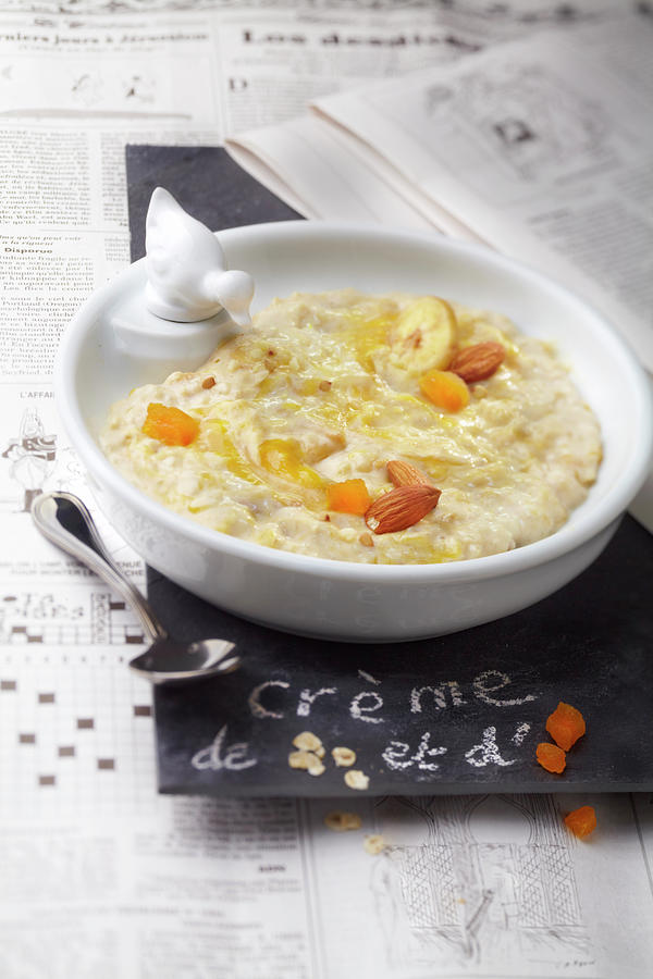 Banana,almond And Dried Apricot Porridge Photograph by Scuiz In