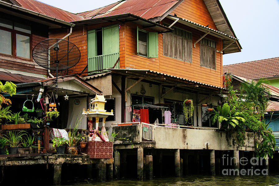 Bangkok Kong Homes and Spirit House Photograph by Bob Phillips