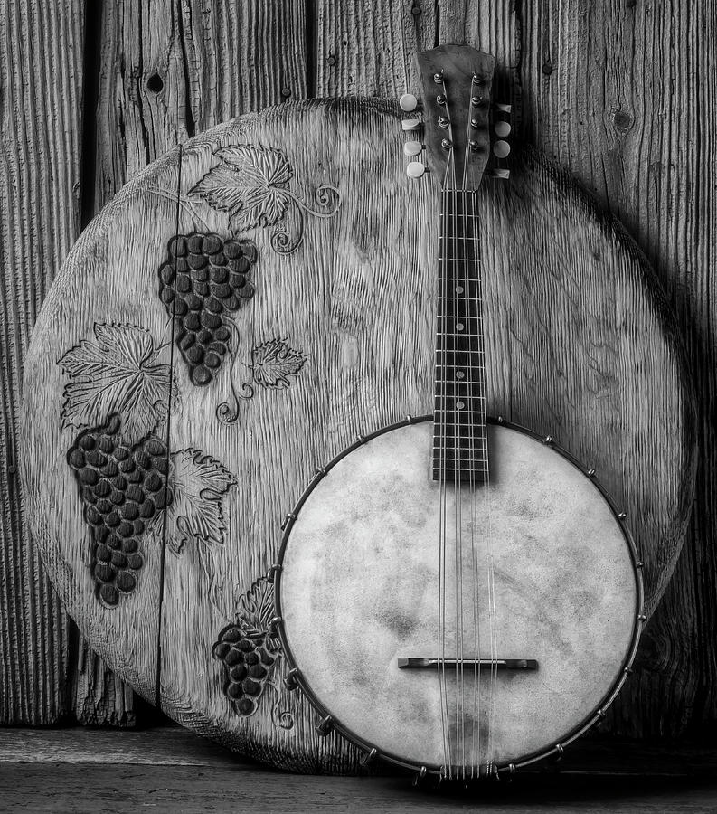 Banjo And Wine Barrel lid Black And White Photograph by Garry Gay