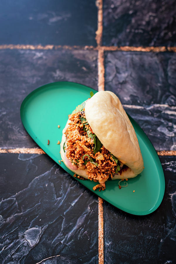Bao Filled With Beeg Short Rib And Garnished With Crispy Onion And Toasted Sesame Seeds Photograph by Hein Van Tonder