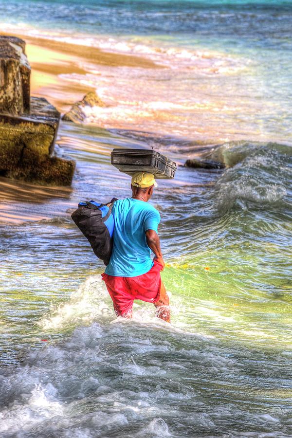 Beach Photograph - Barbados Beach Seller In Heavy Surf by David Pyatt