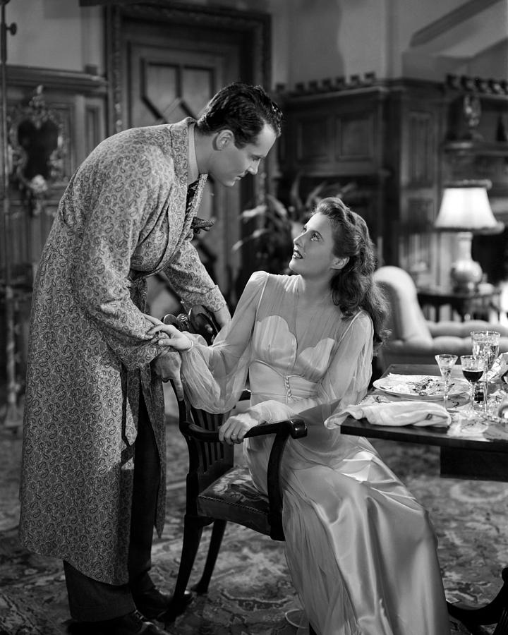 Barbara Stanwyck Looking At Henry Fonda At Dining Table Photograph by ...