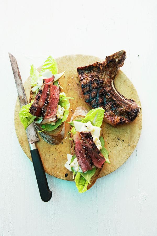 Barbecue Sandwiches With Beefsteak And Lettuce Photograph by Michael Wissing