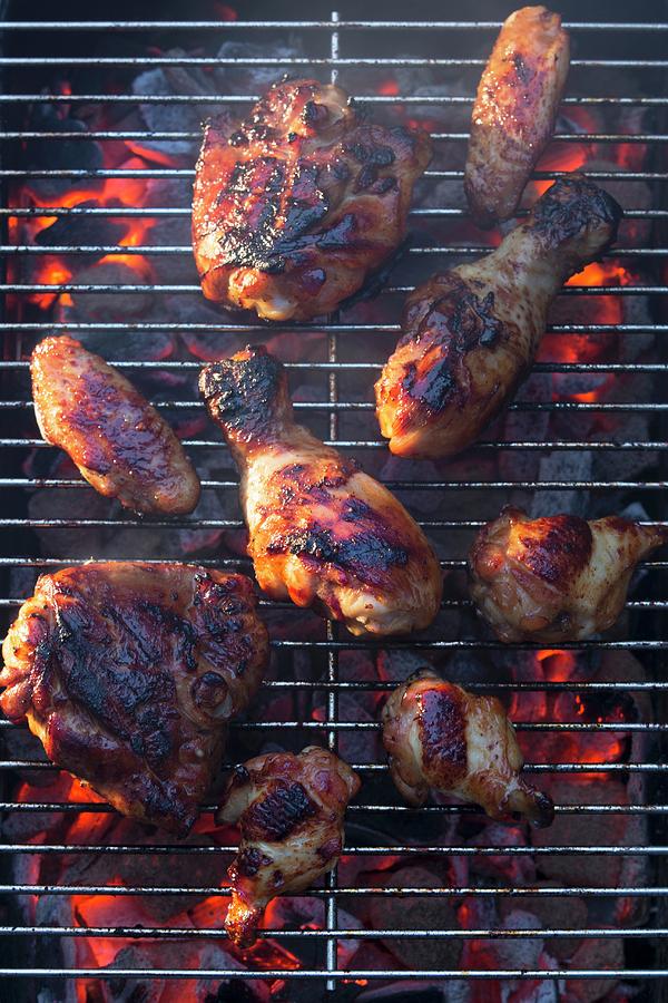 Barbecued Chicken On The Grill Photograph by Jalag / Joerg Lehmann