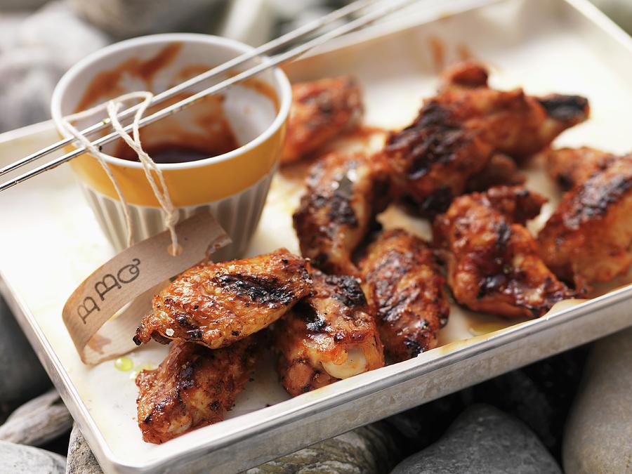 Barbecued Chicken Wings With Barbecue Sauce Photograph by Eising Studio - Food Photo & Video