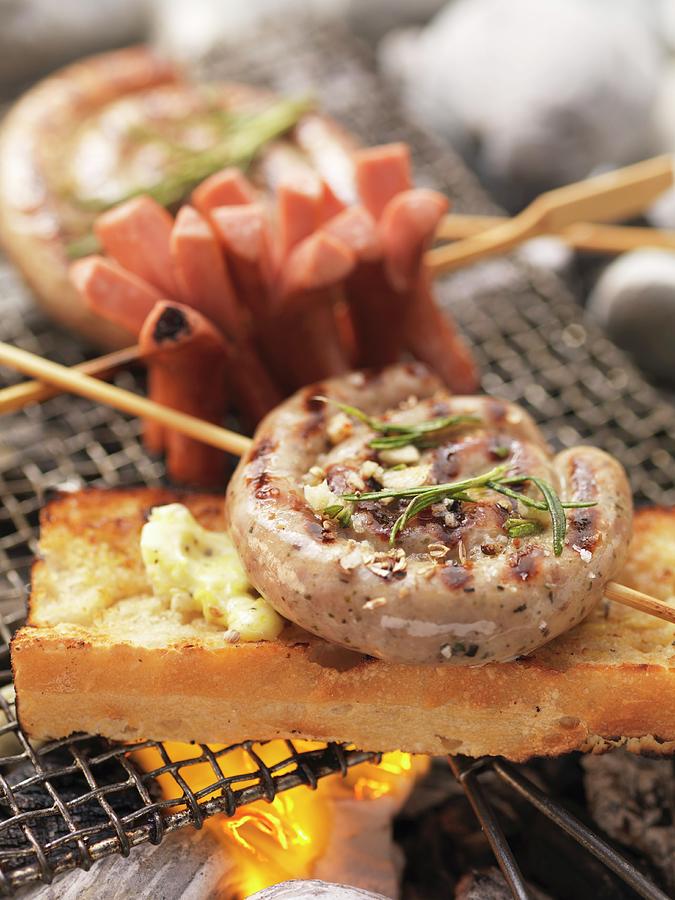 Barbecued Sausage Skewers With Garlic Bread Photograph by Eising Studio - Food Photo & Video