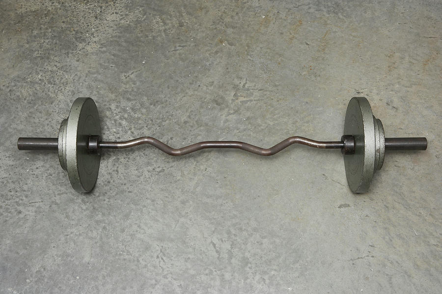 Barbell On Concrete Floor, Overhead View Photograph by Thomas Northcut